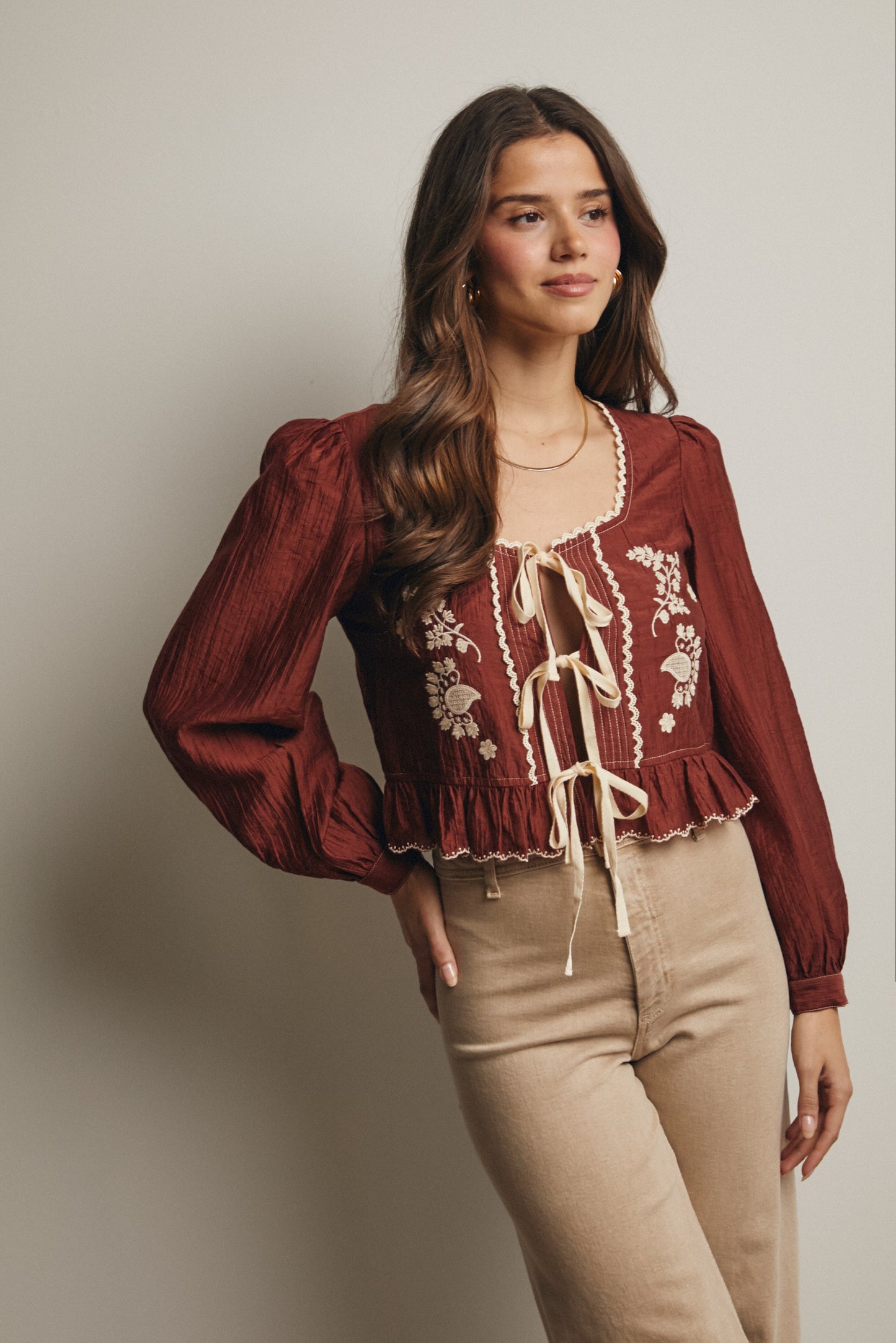 Embroidered Tie Front Peplum Blouse