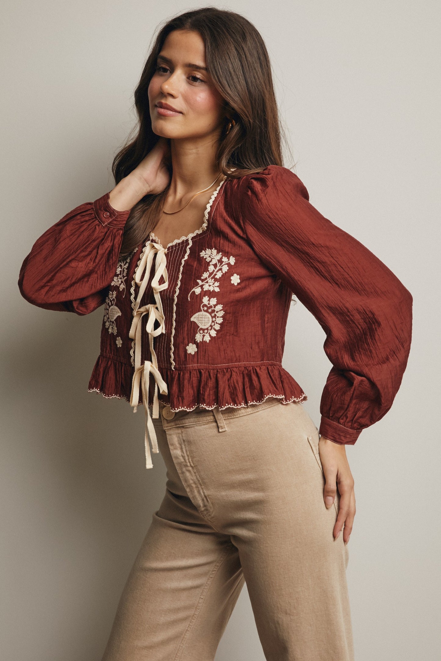 Embroidered Tie Front Peplum Blouse