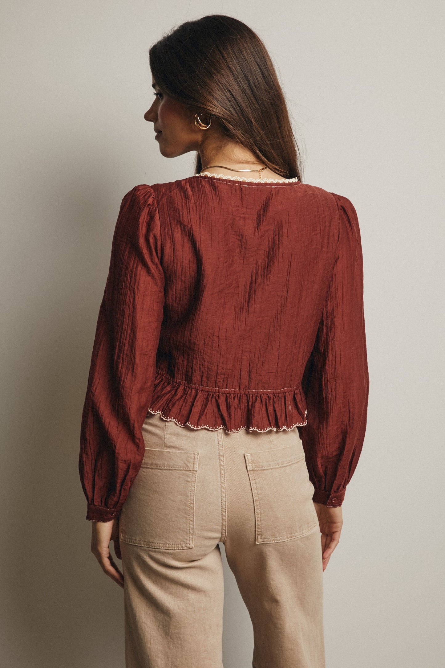 Embroidered Tie Front Peplum Blouse