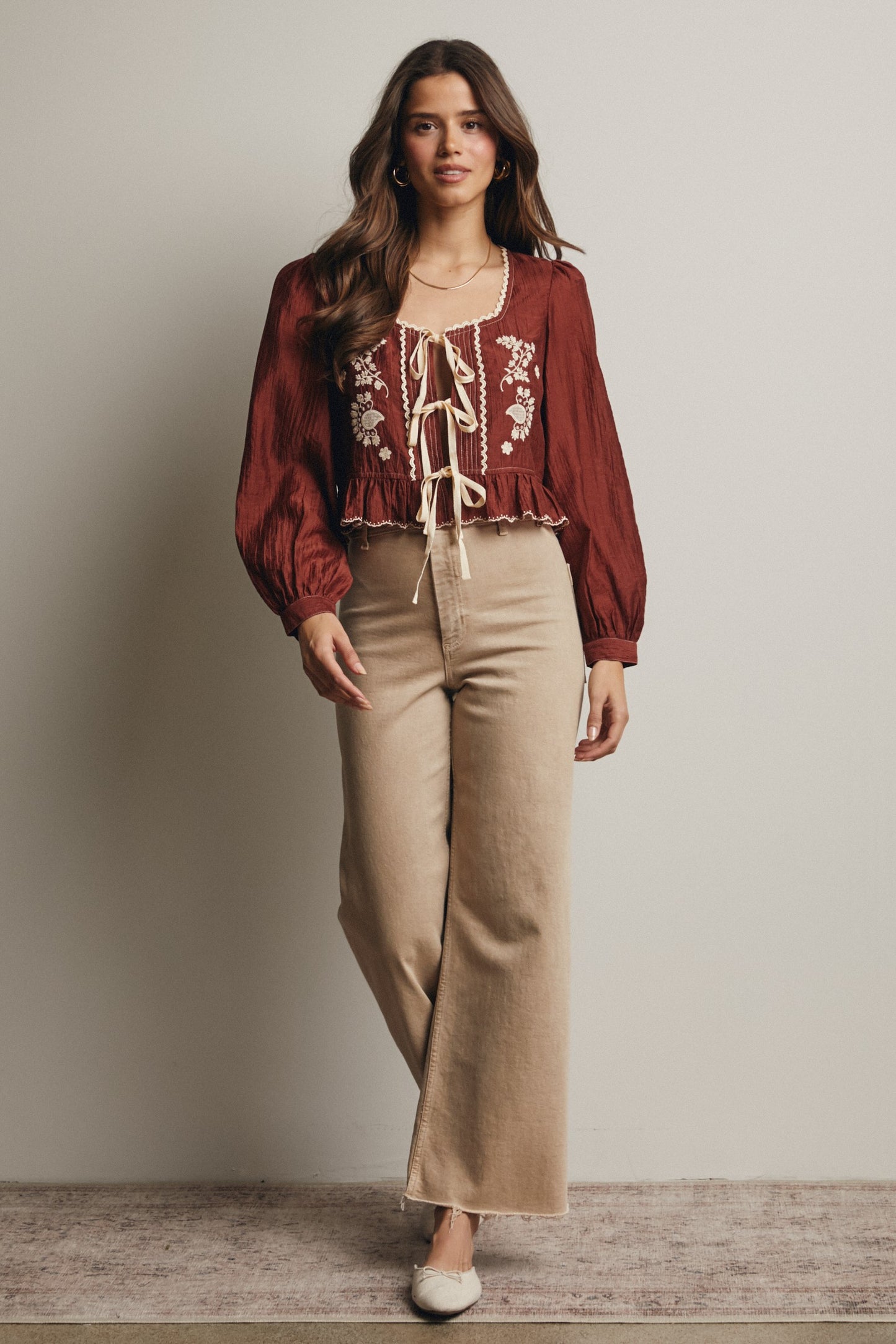 Embroidered Tie Front Peplum Blouse